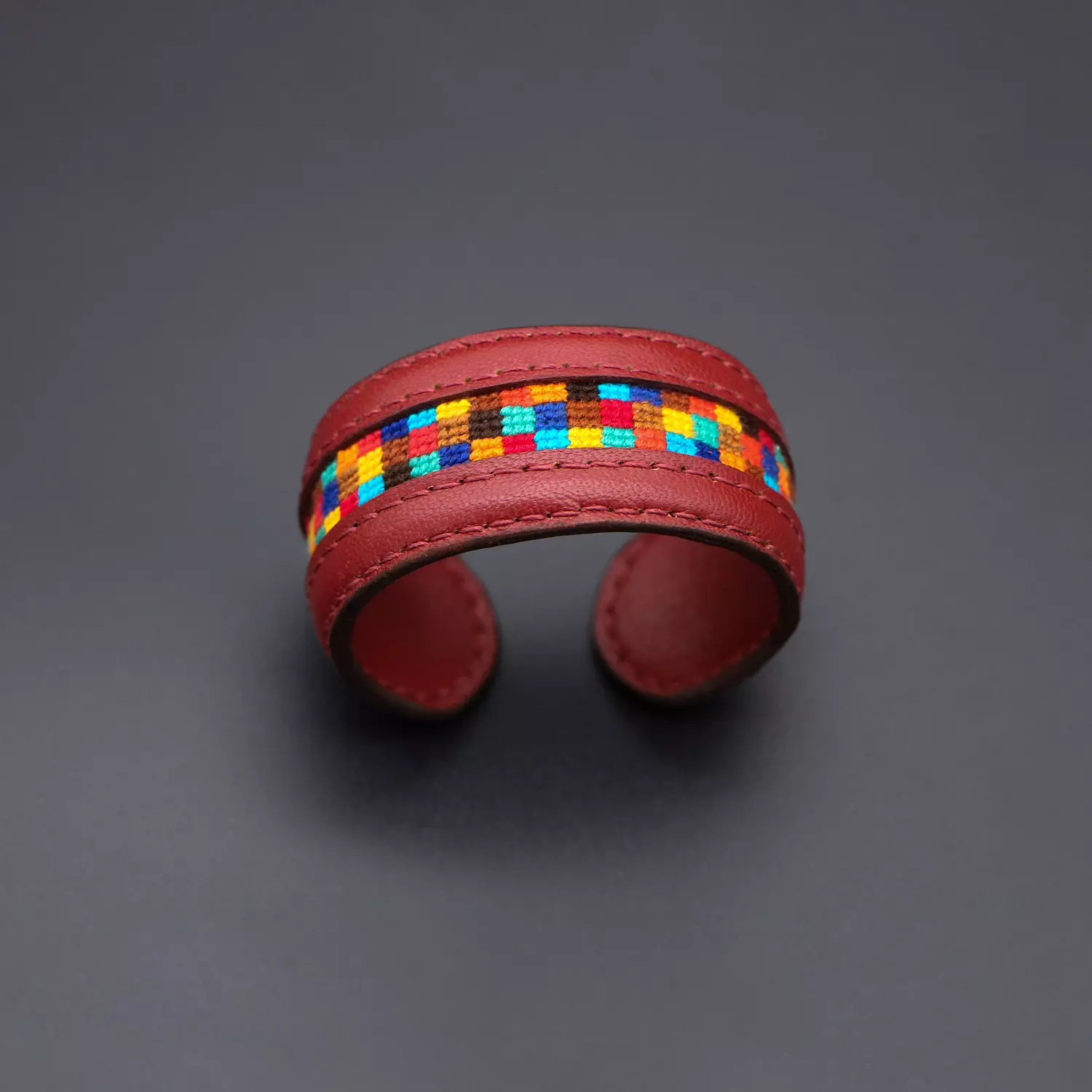 Burgundy Genuine leather cuff with colorful Cross-stitching hover image