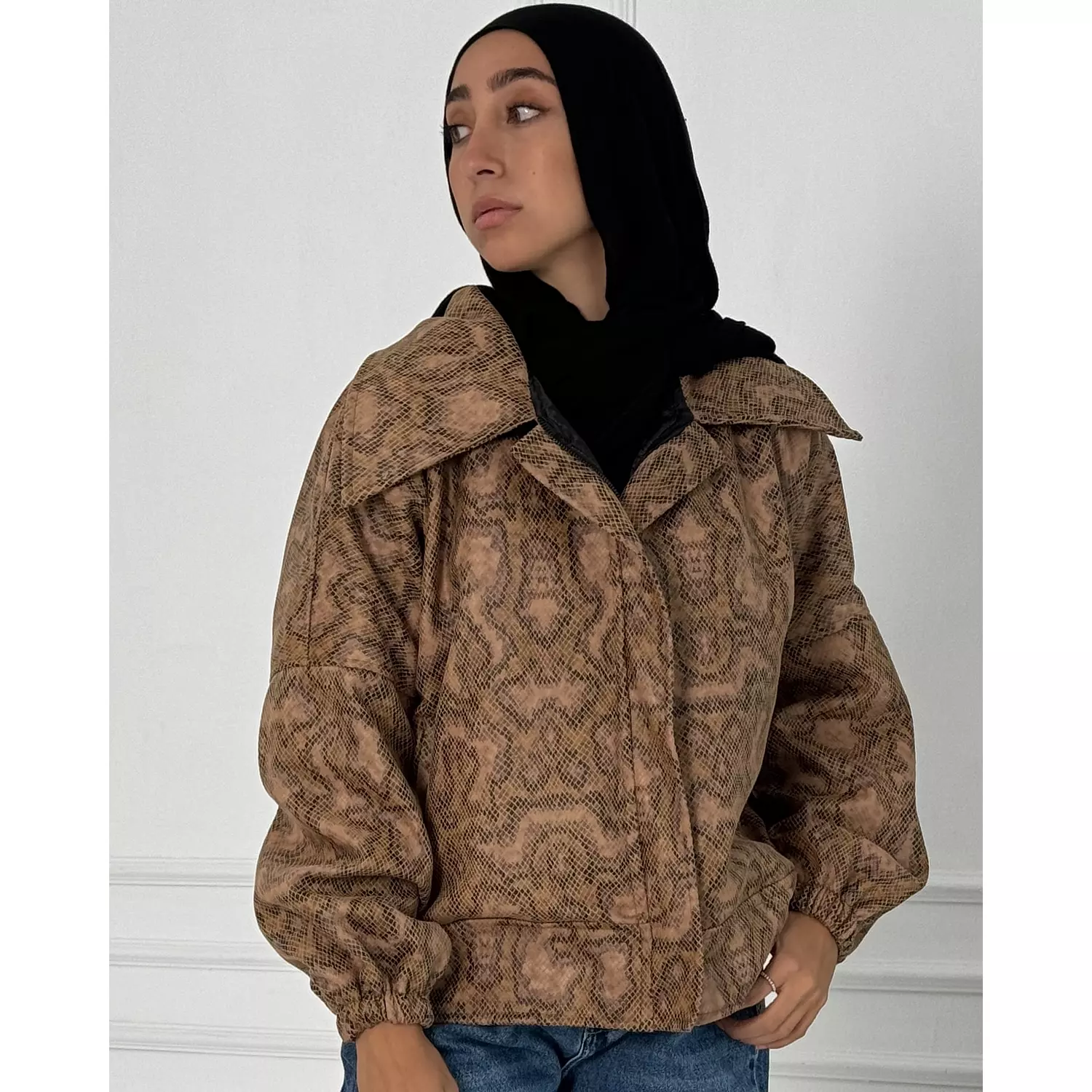 Beige snake leather jacket hover image