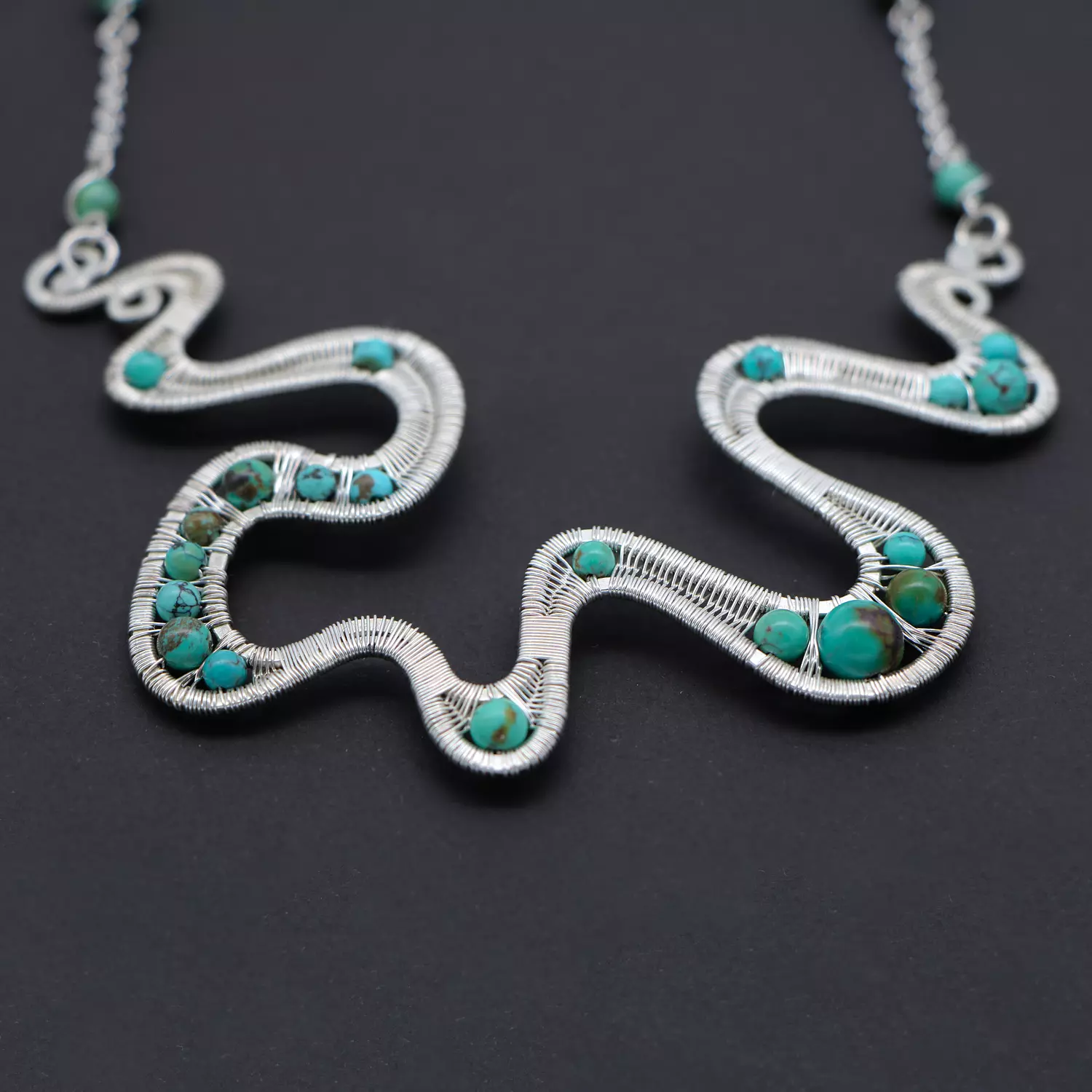 Wire wrapped silver necklace with turquoise gemstones . 2