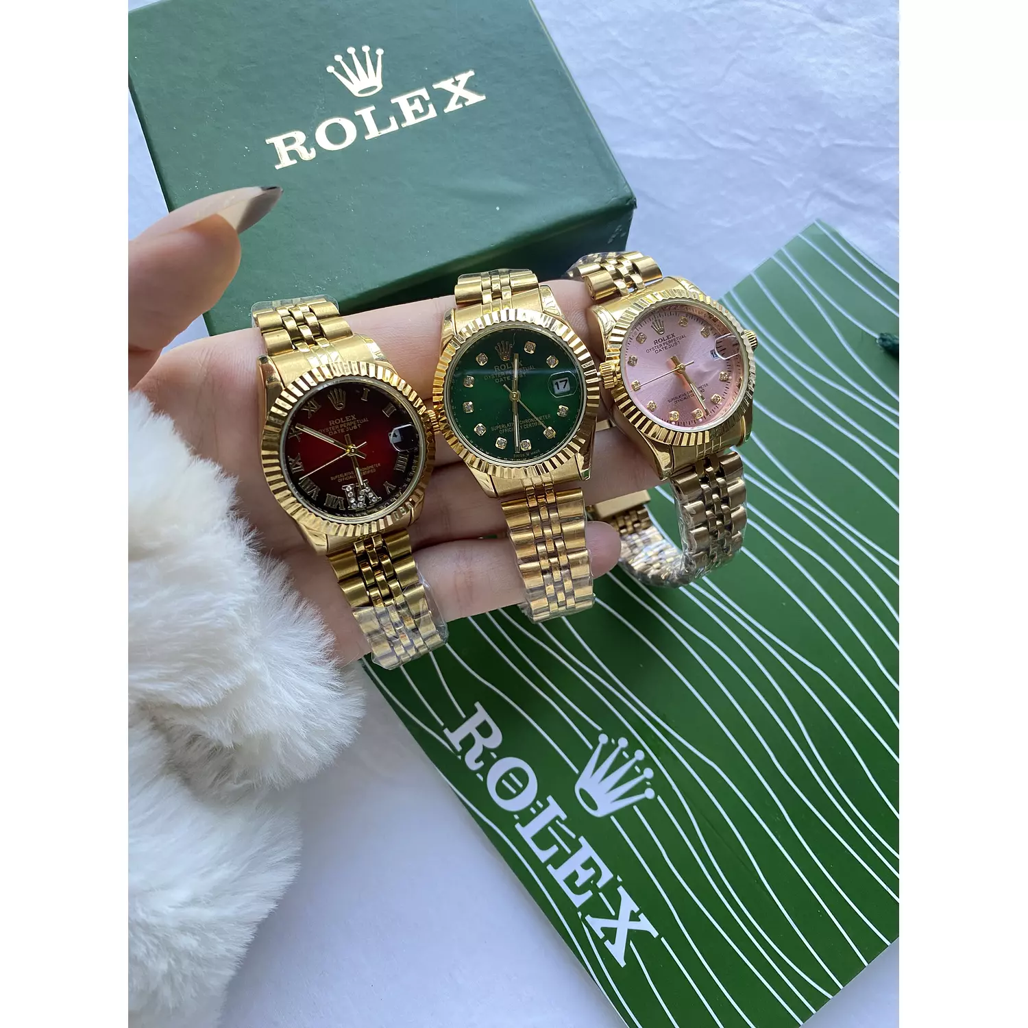 Gold Rolex watch hover image