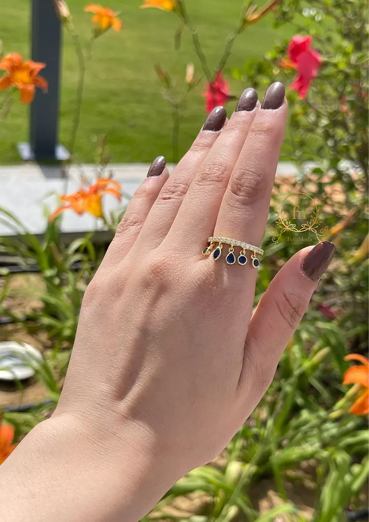 Silver ring gold plated with dangling blue stones medium size