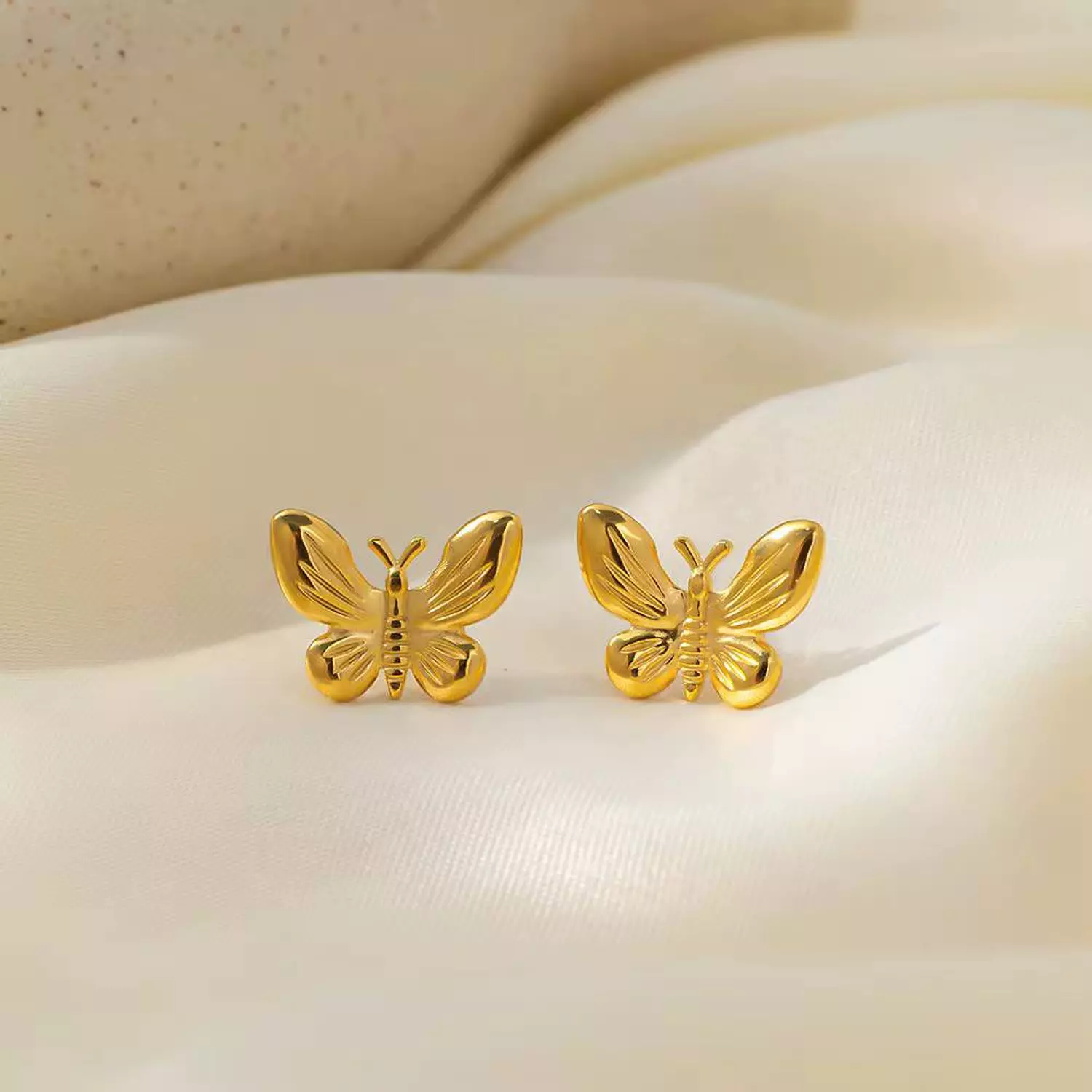 Gold Butterfly earring  hover image