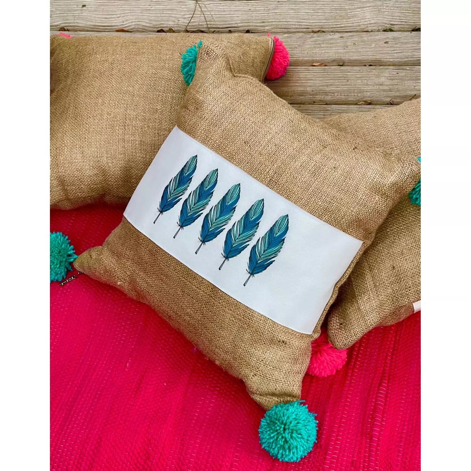 The Burlap Feather Cushion Turquoise Pompoms hover image