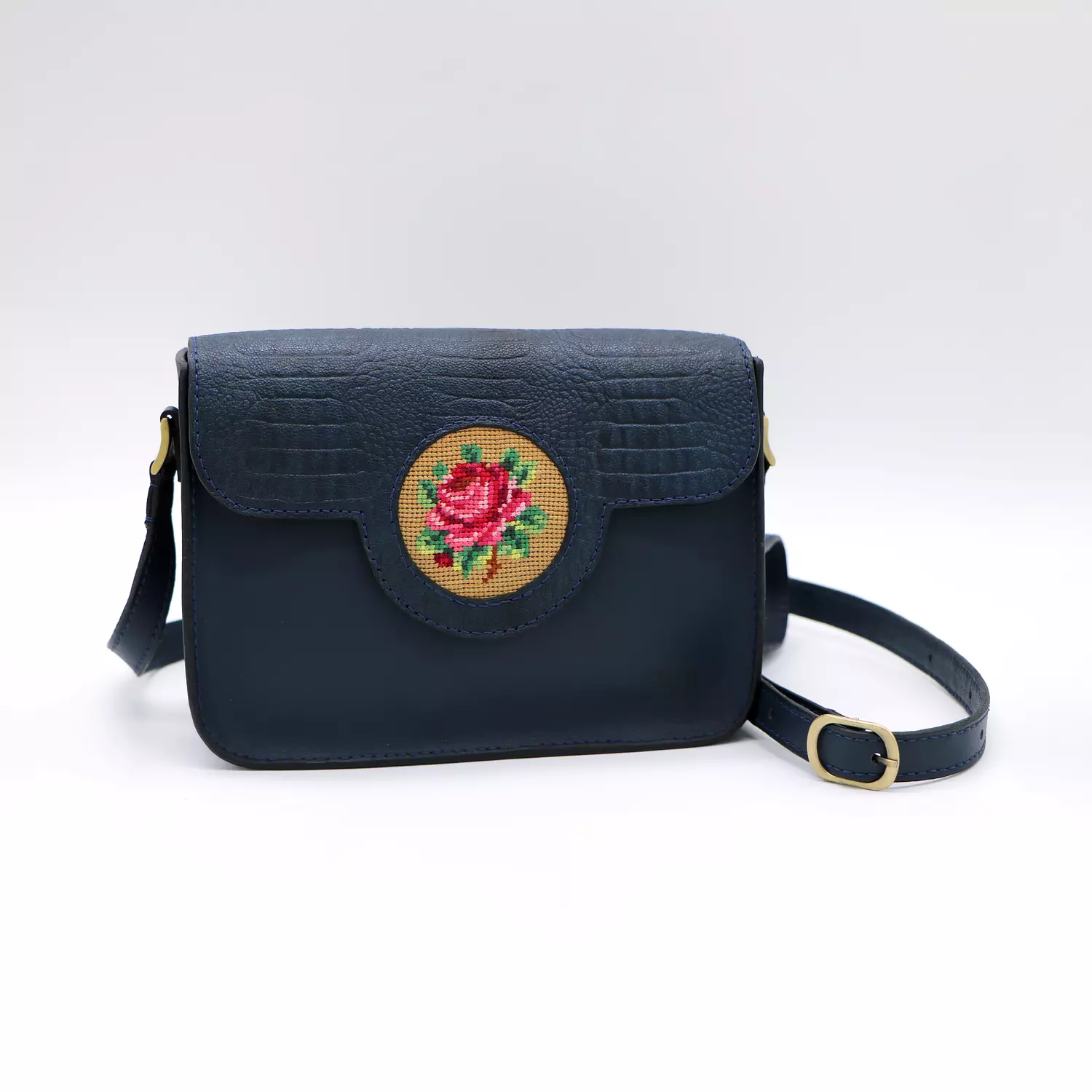 Genuine leather bag with floral design. hover image