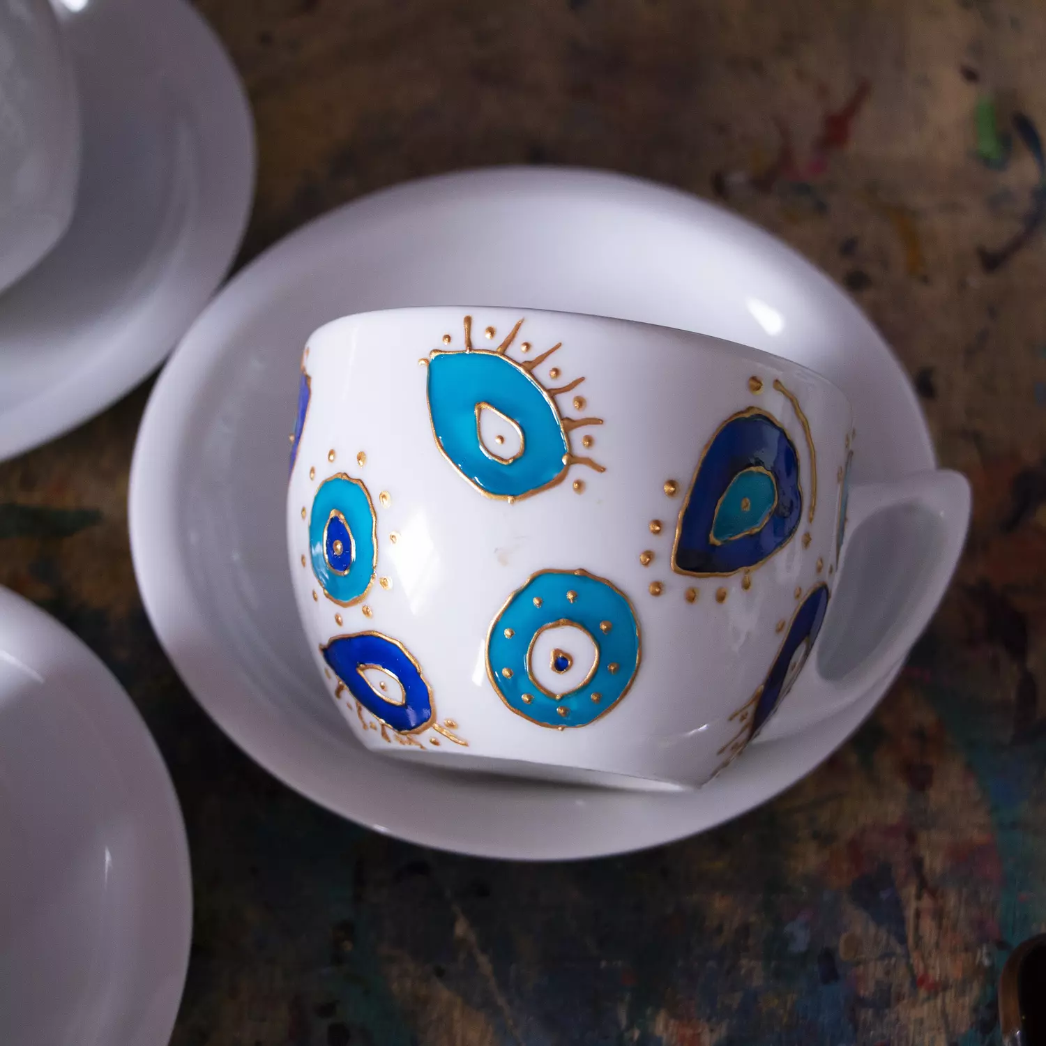 Blue eyes cappuccino and teacup 1