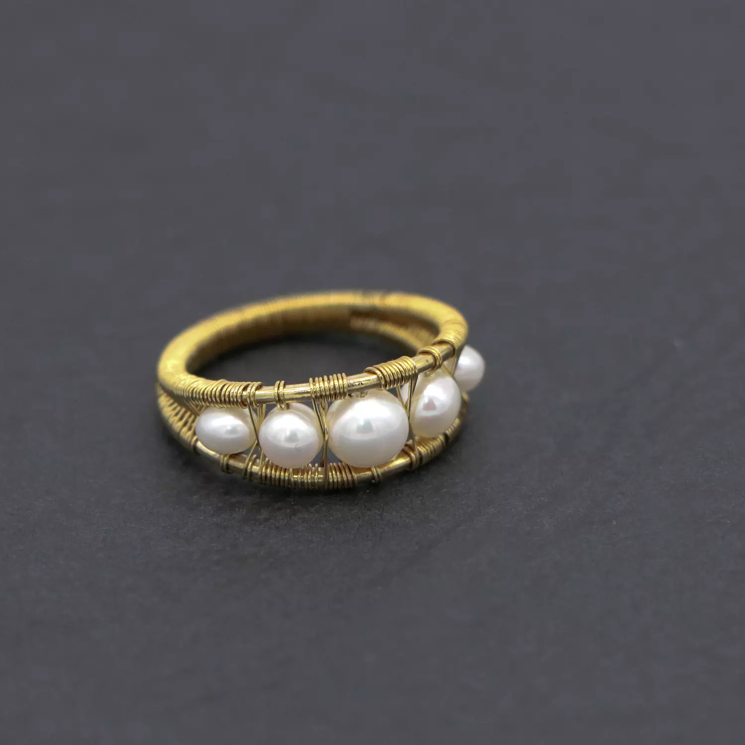 Wire wrapped brass ring with pearls. hover image