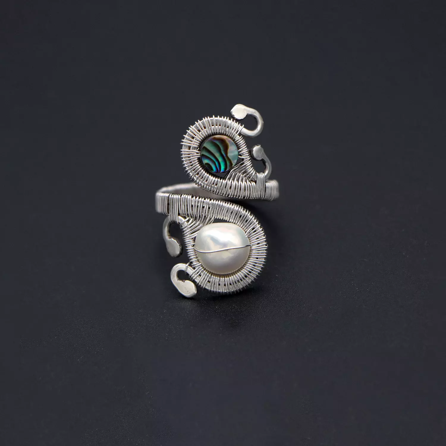 Long silver ring with abalone shell and pearl. hover image