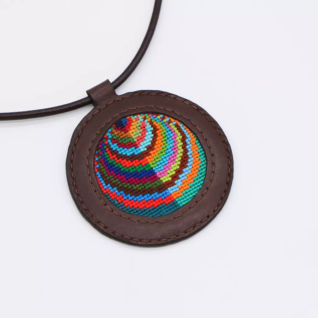 Genuine leather necklace with colorful Cross-stitching.