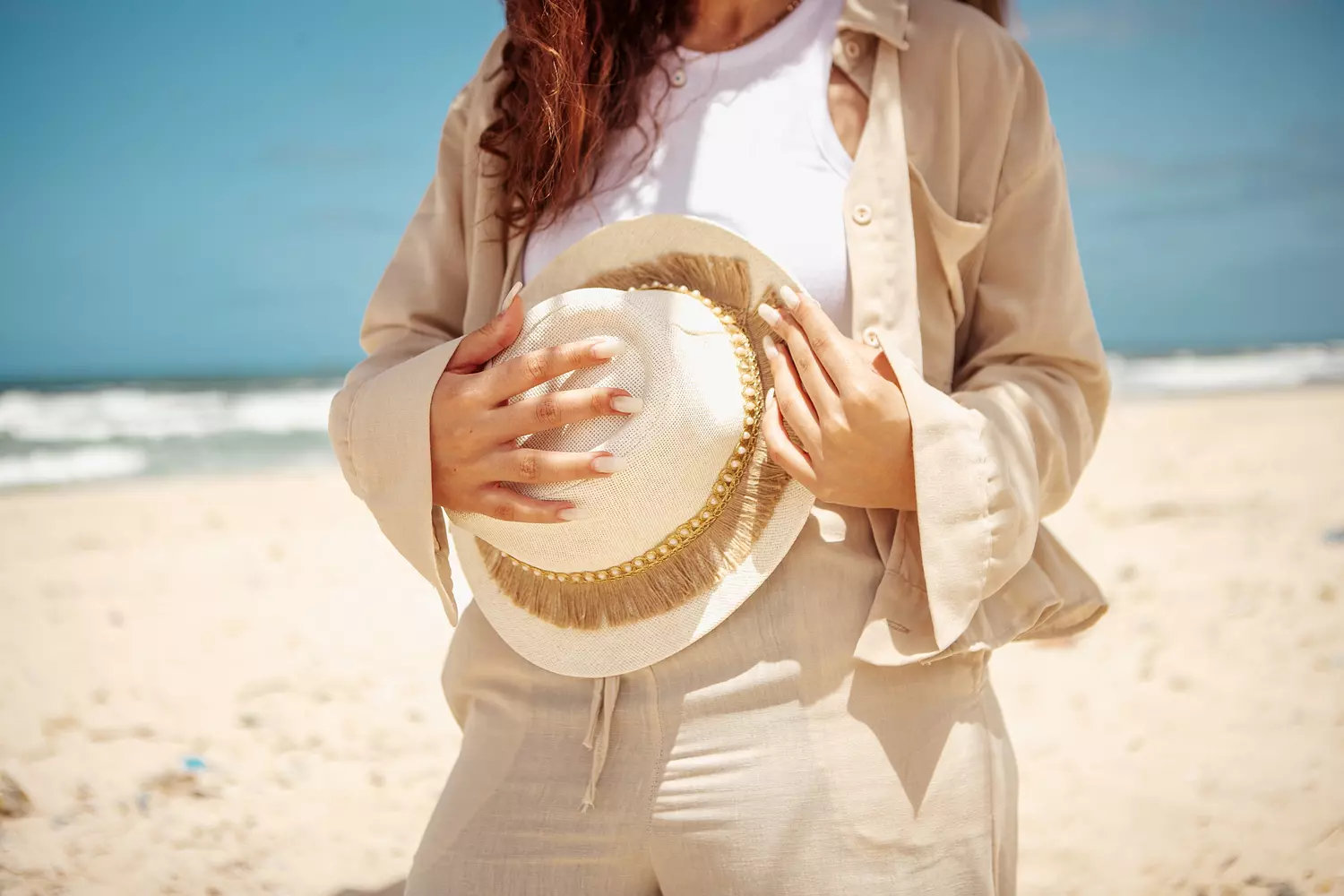 Beige beach hat hover image