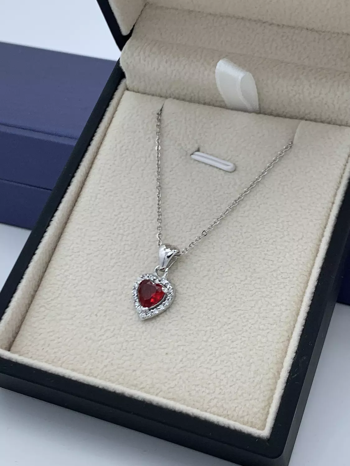 Ruby heart necklace hover image