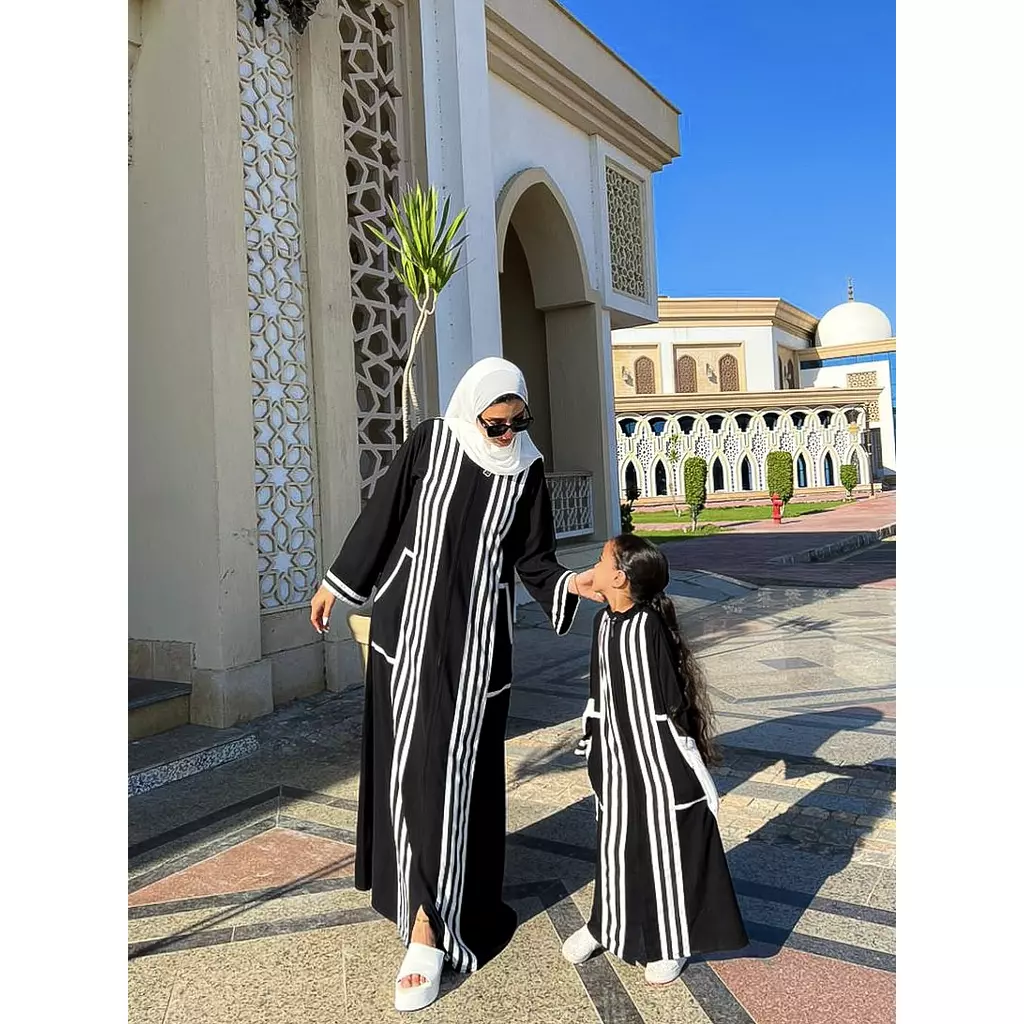 closed black abaya kids