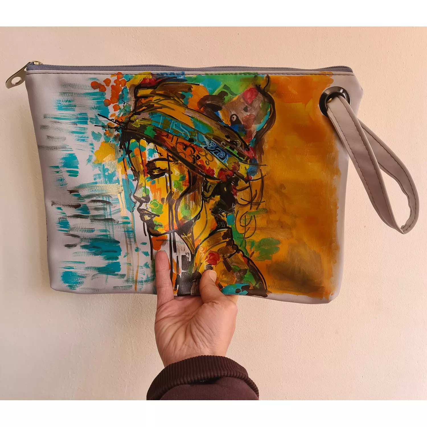 African woman leather clutch  hover image