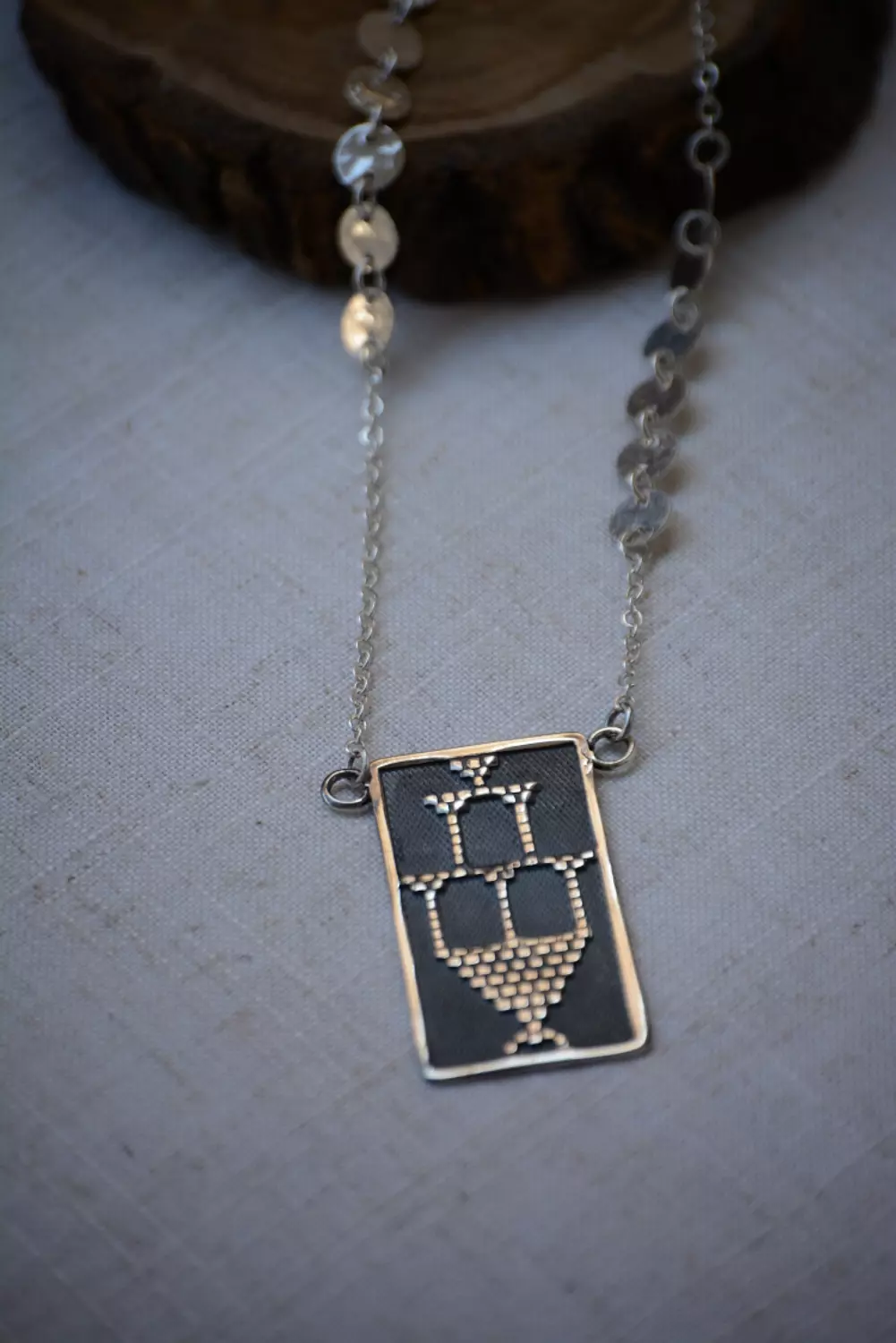 The chandelier tally necklace hover image