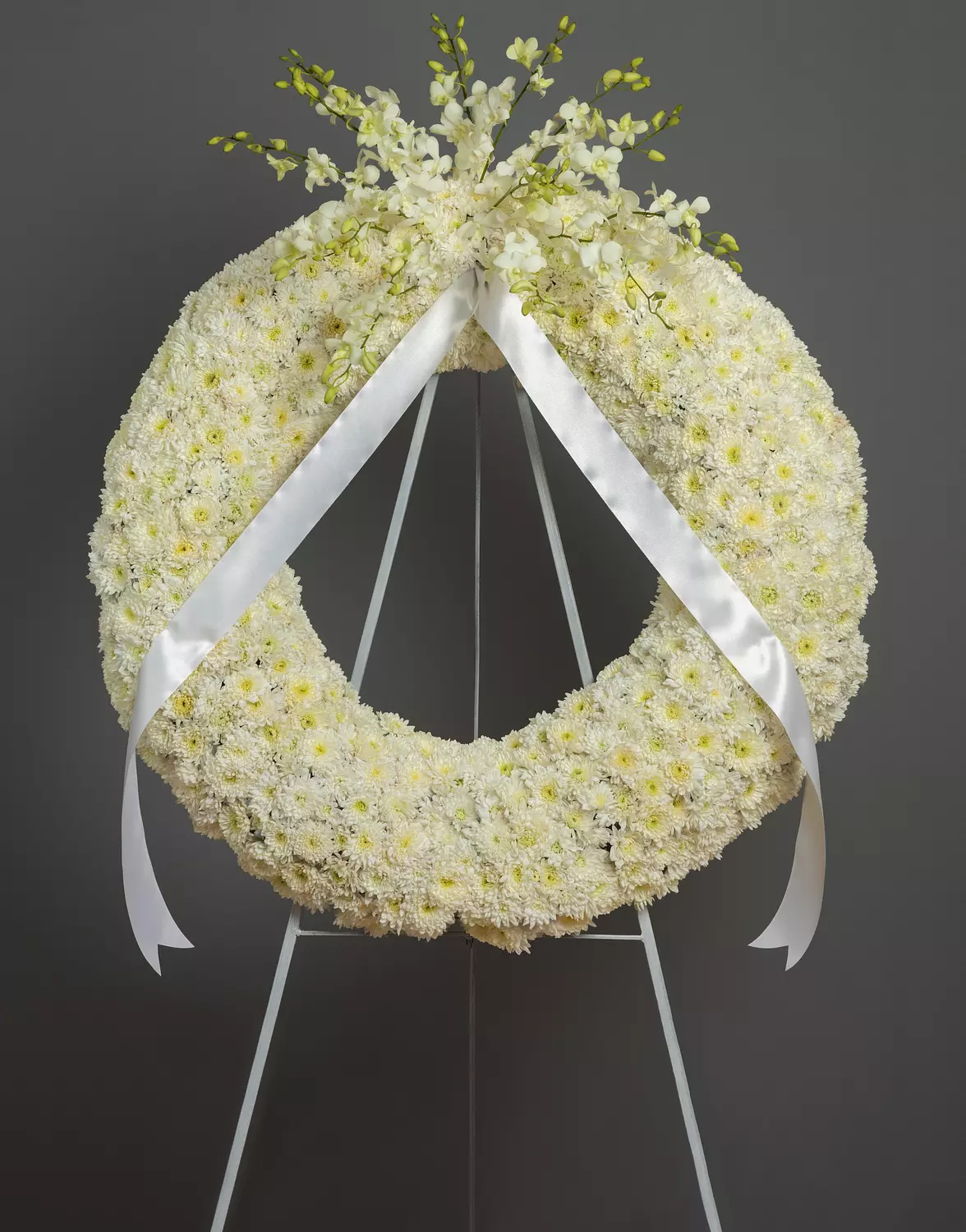 Peaceful Flower Wreath Stand with Orchids  hover image