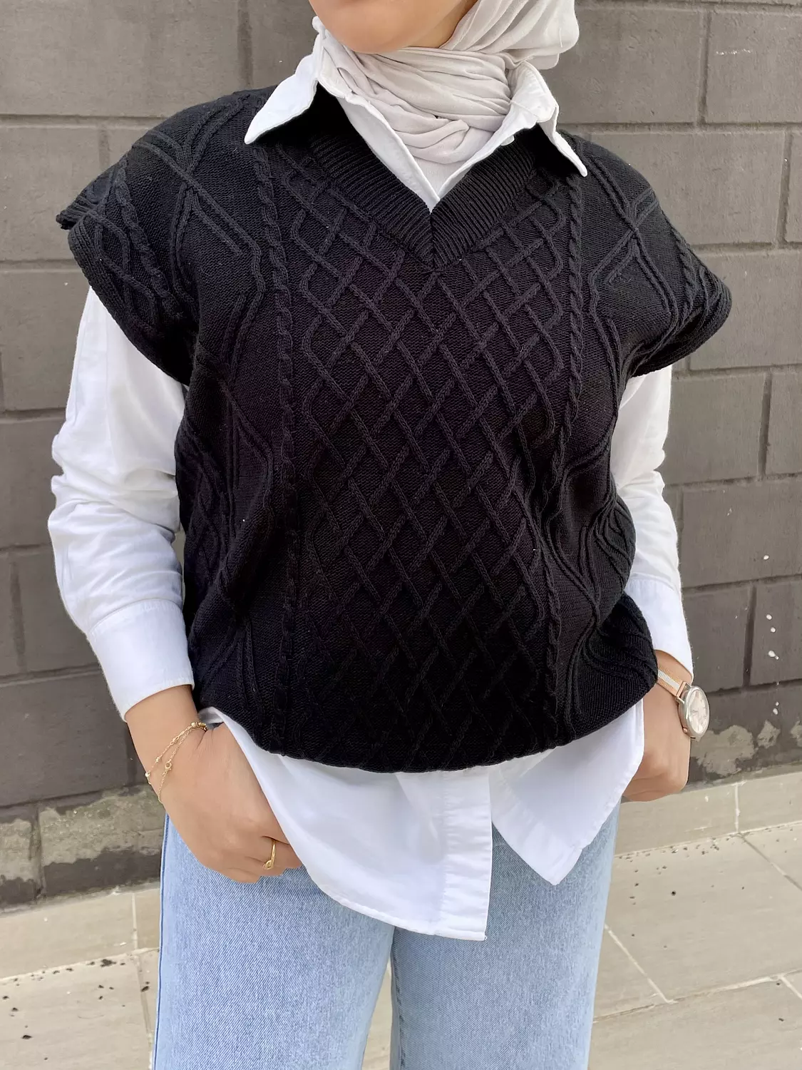 Knitted vest in black hover image