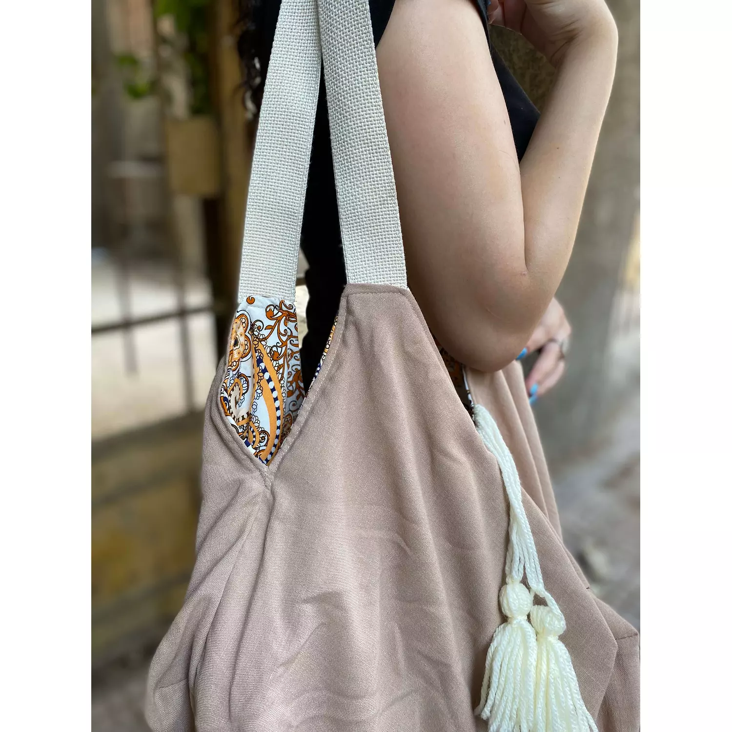 beige double faced bag. 1