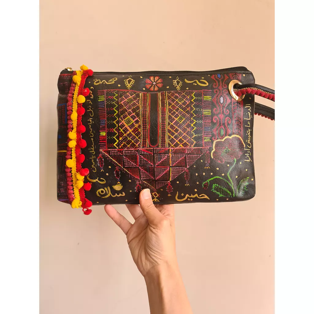 Tatreez pattern leather clutch 