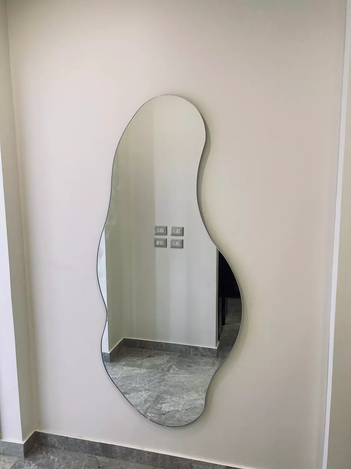 Asymmetric wall mirror  hover image