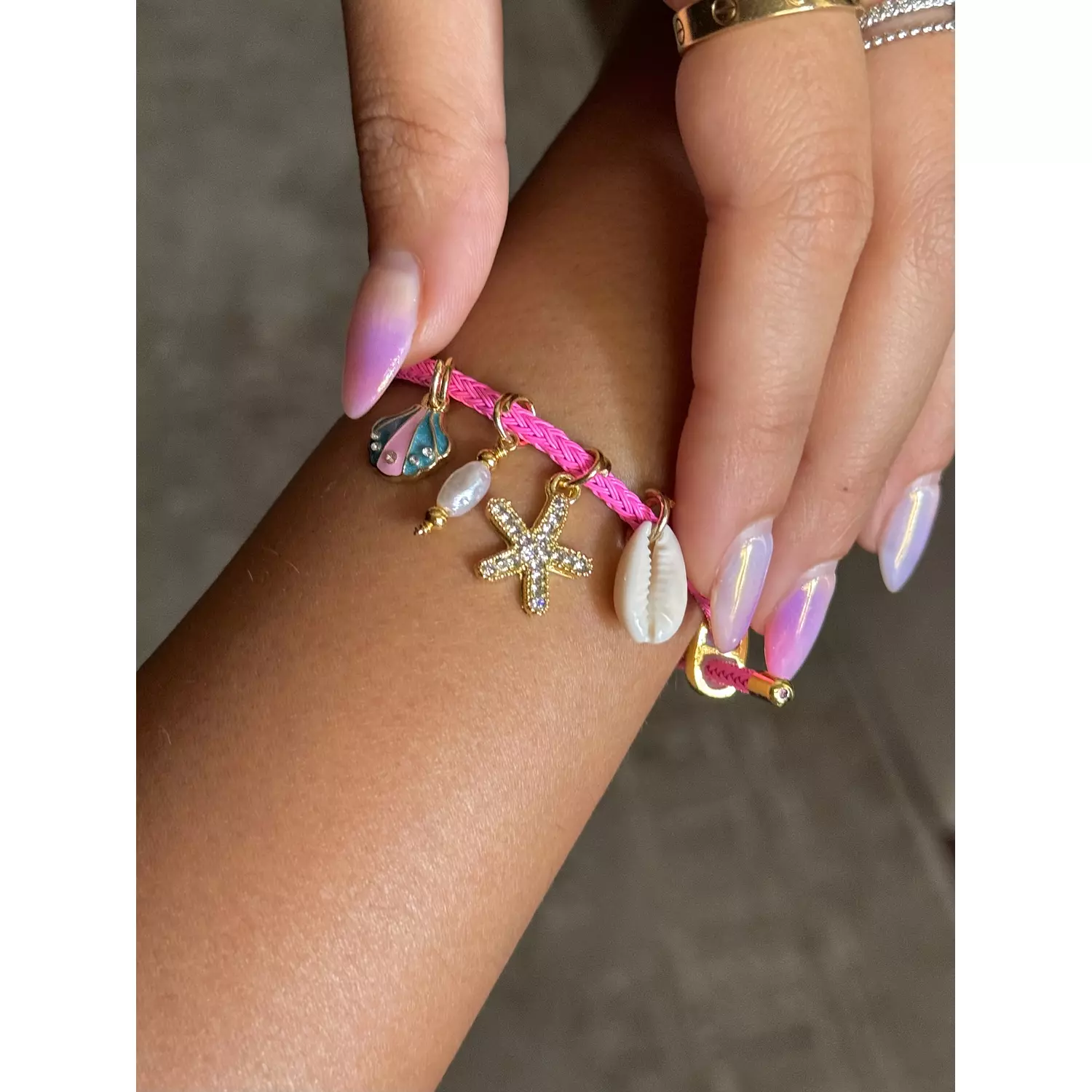 Hot pink charmy bracelet  hover image