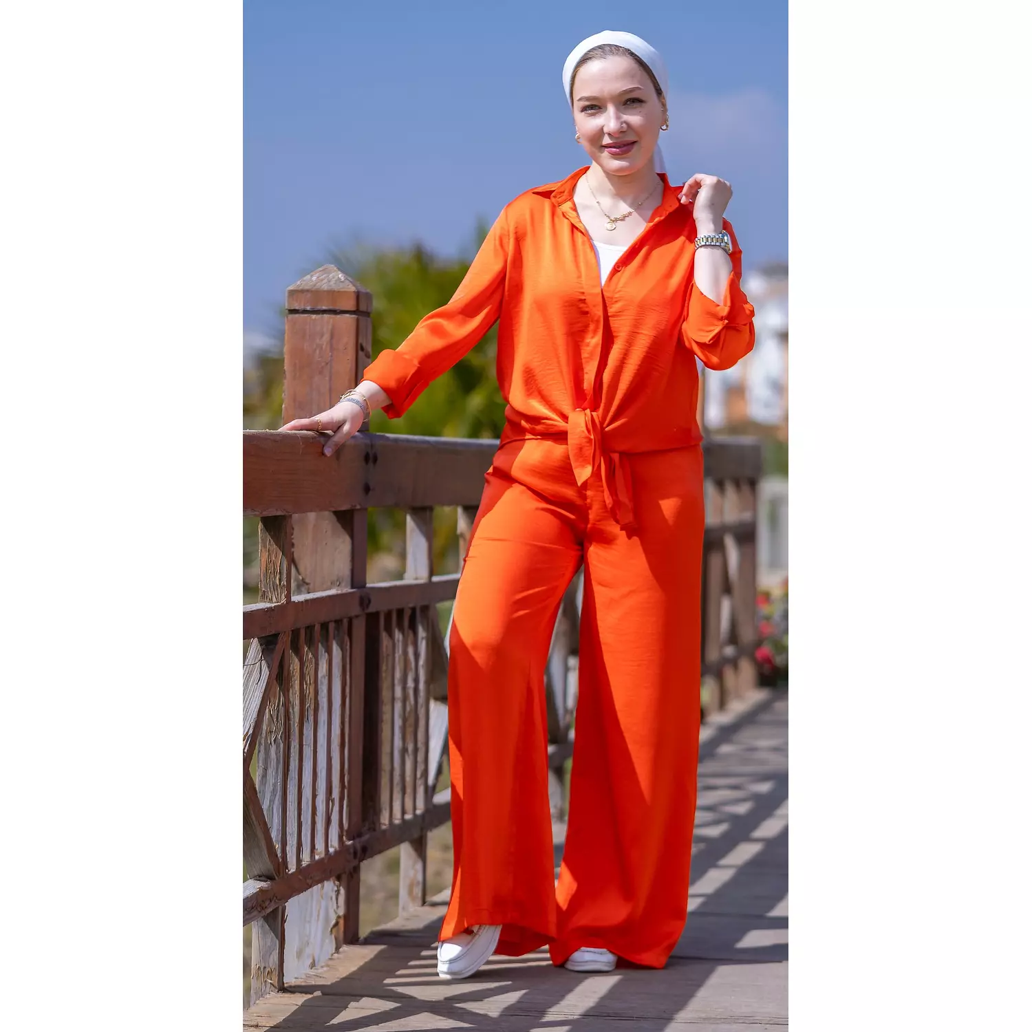 Orange satin pants hover image