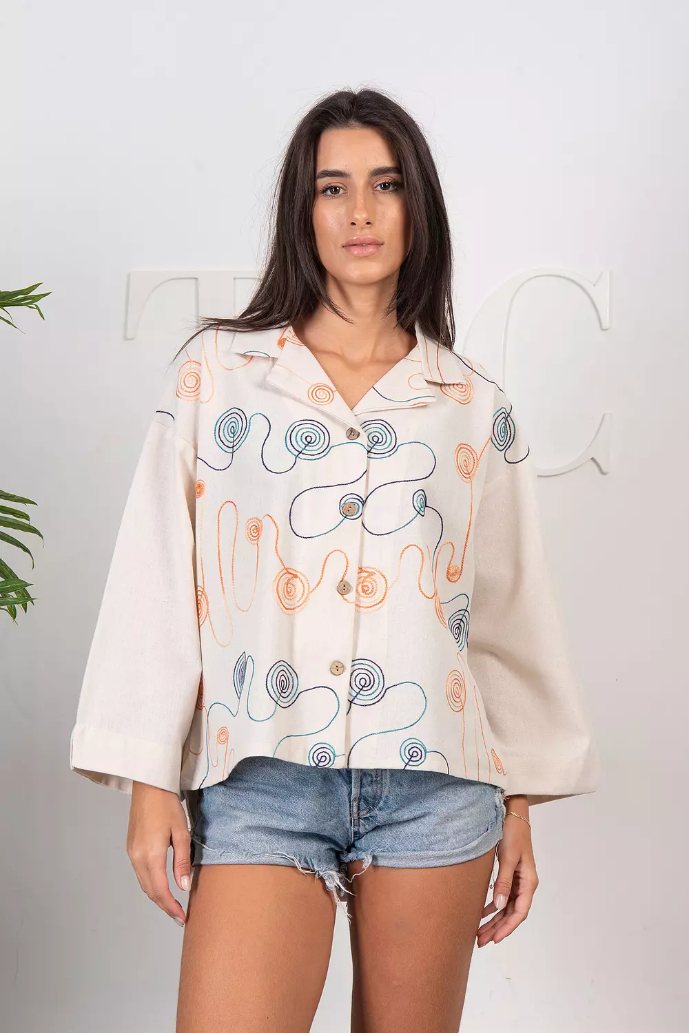 Embroidered linen blouse hover image