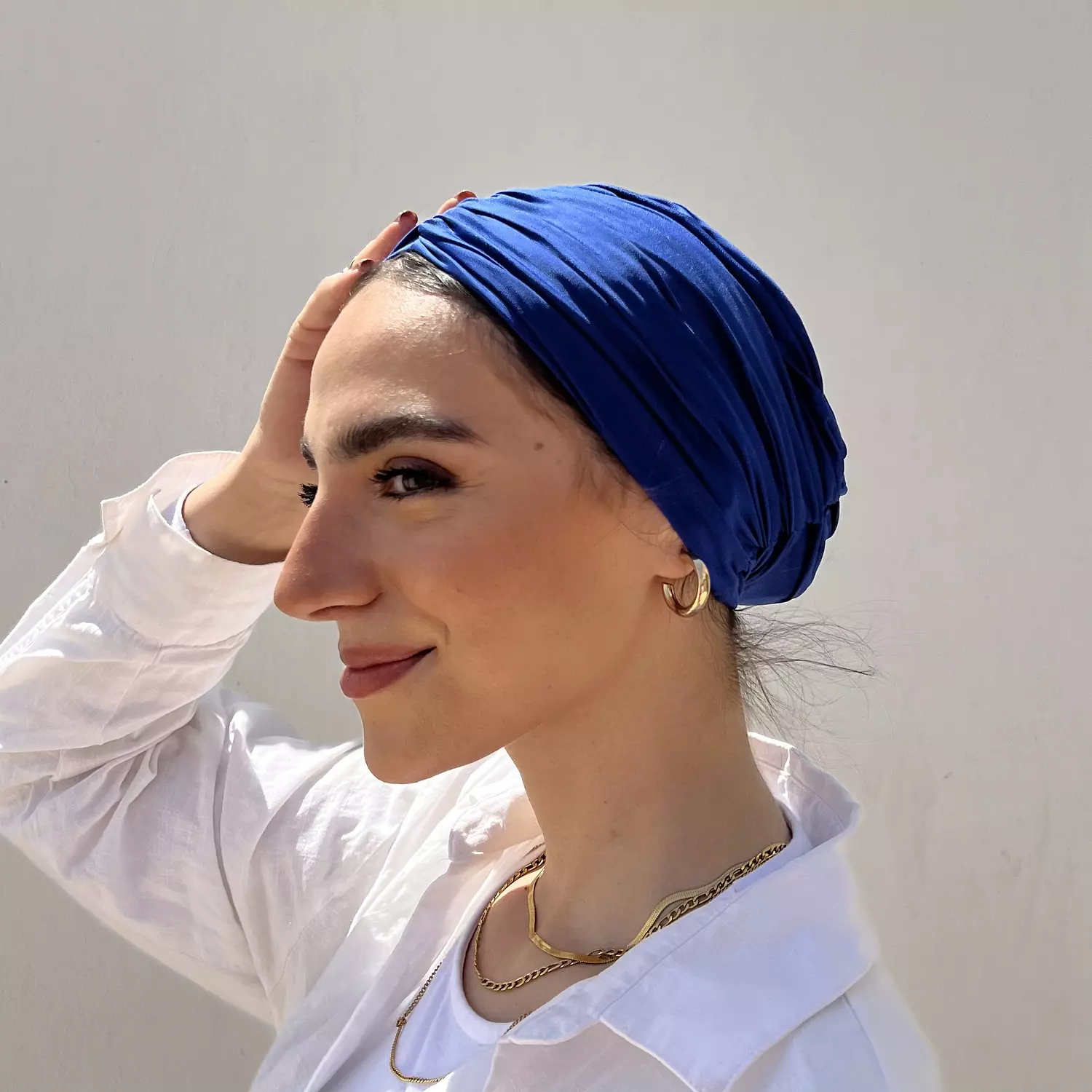 The electric blue turban hover image