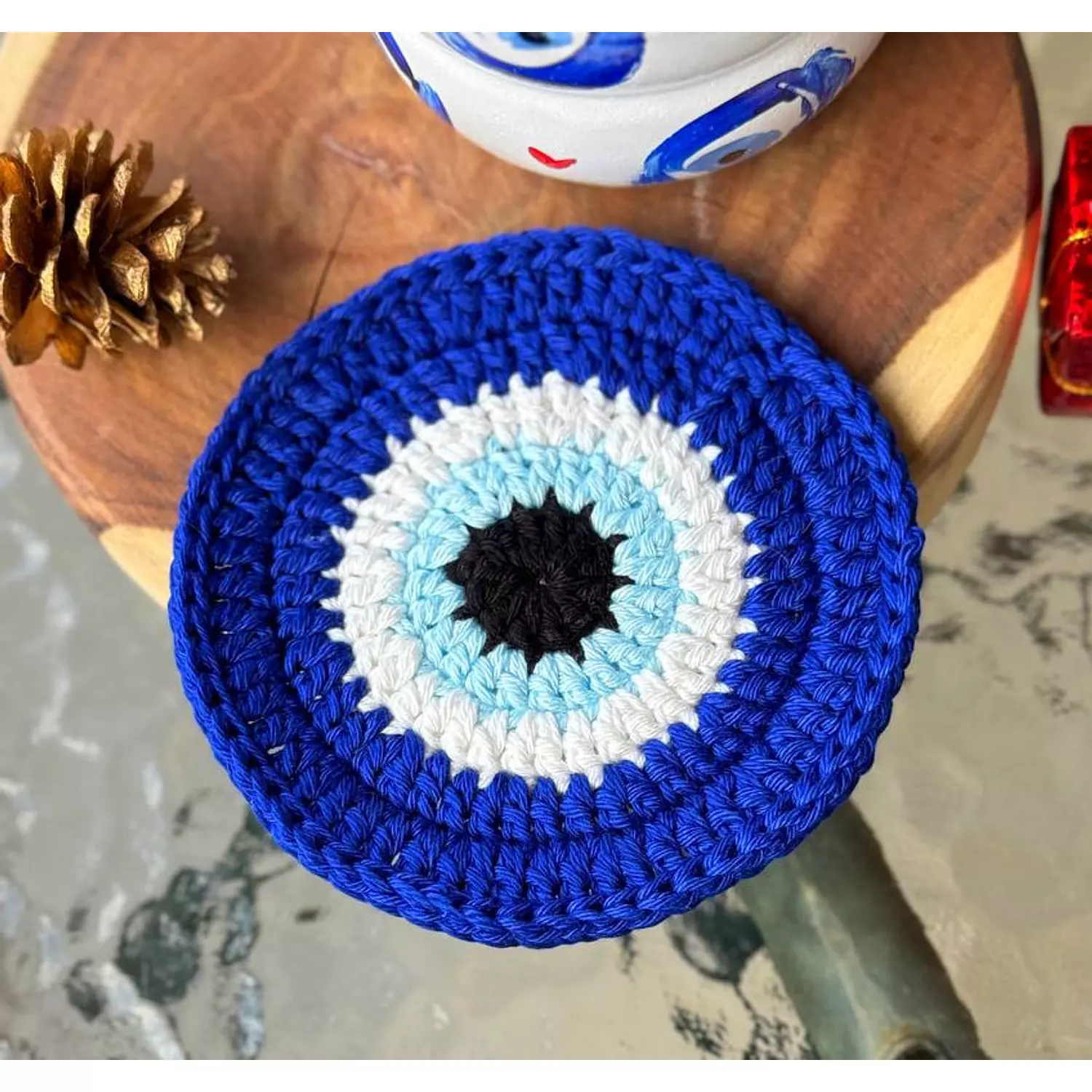 Evil eye crochet coaster hover image