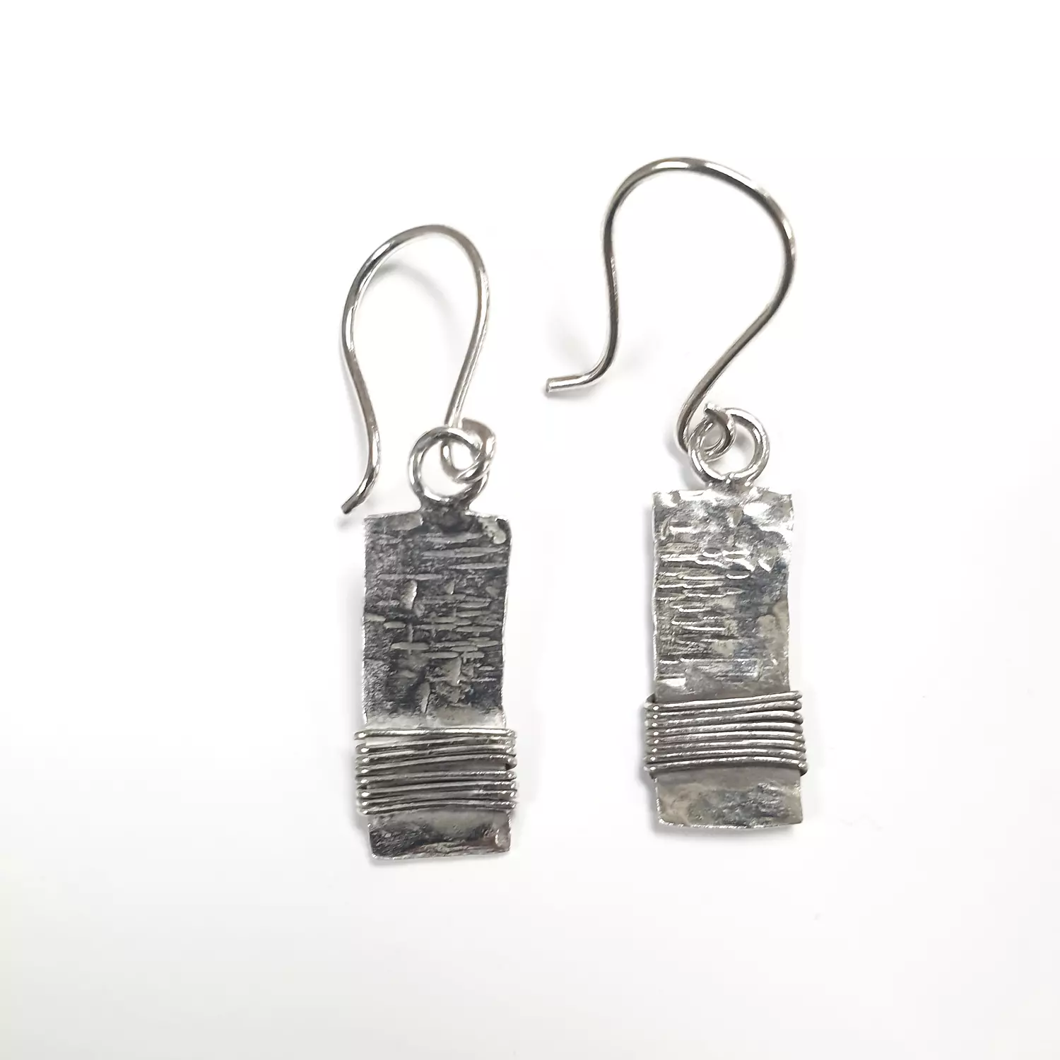 Textured silver earring hover image