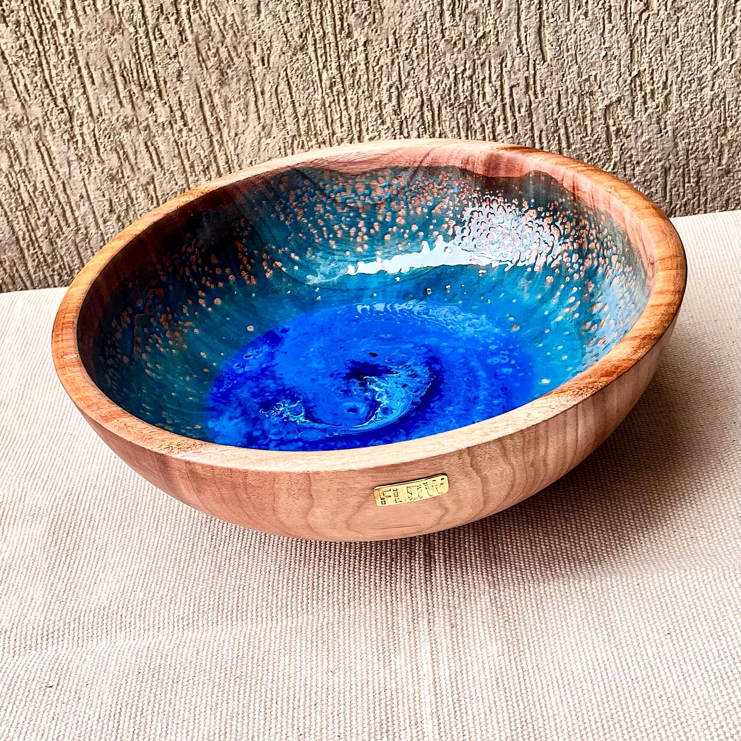 Blue light wooden bowl hover image