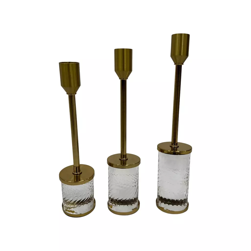 set of three decorative candlesticks