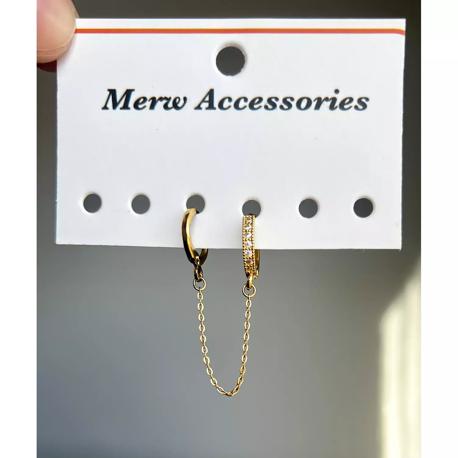 Transparent stones connect earring  hover image