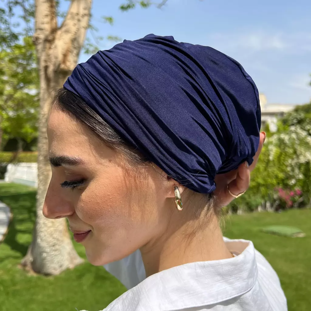 The navy blue turban