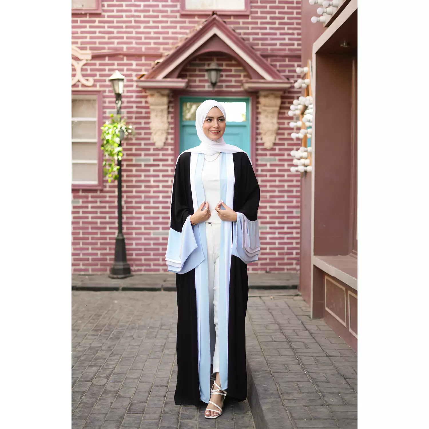 Shades of Blue on Sleeves in Abaya hover image