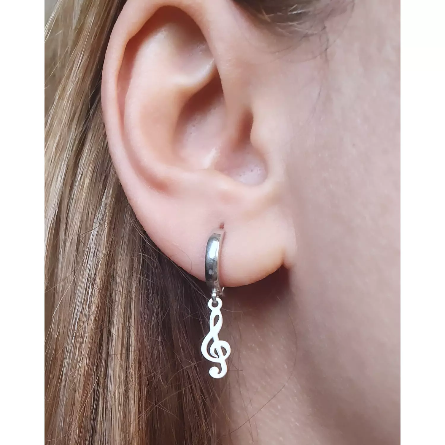 Sol music key earrings hover image