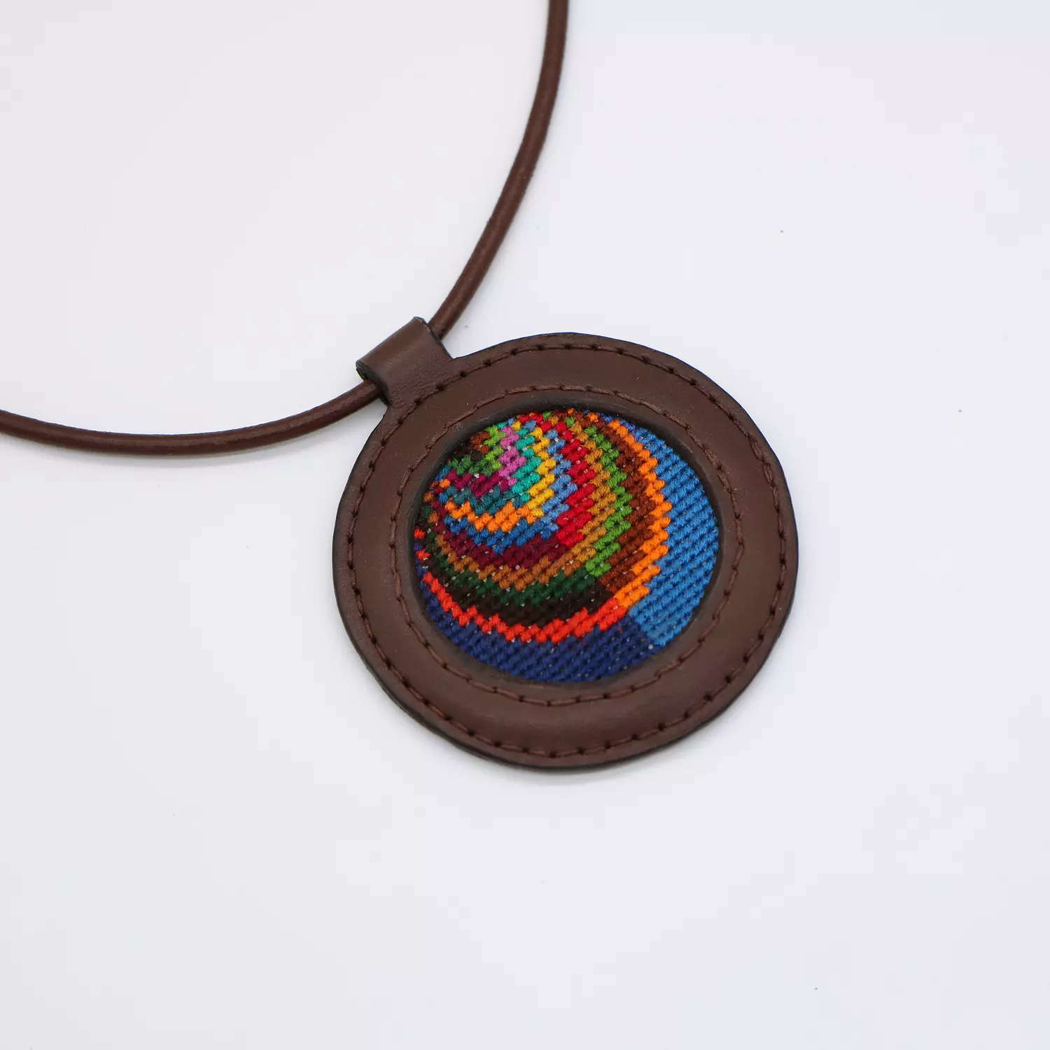 Genuine leather necklace with colorful Cross-stitching. hover image