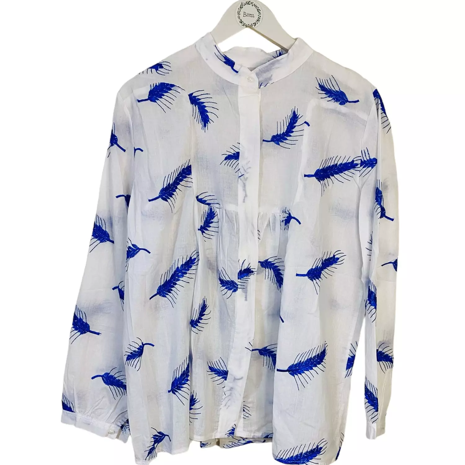 The White Shirt with leaves pattern hover image