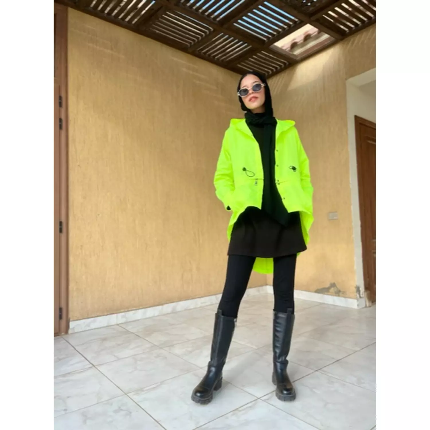 Neon waterproof jacket hover image