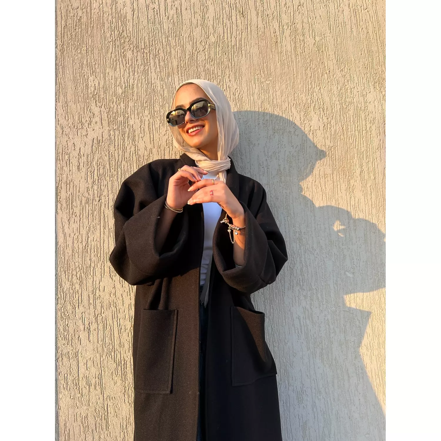 The heavy wool coat in black  hover image