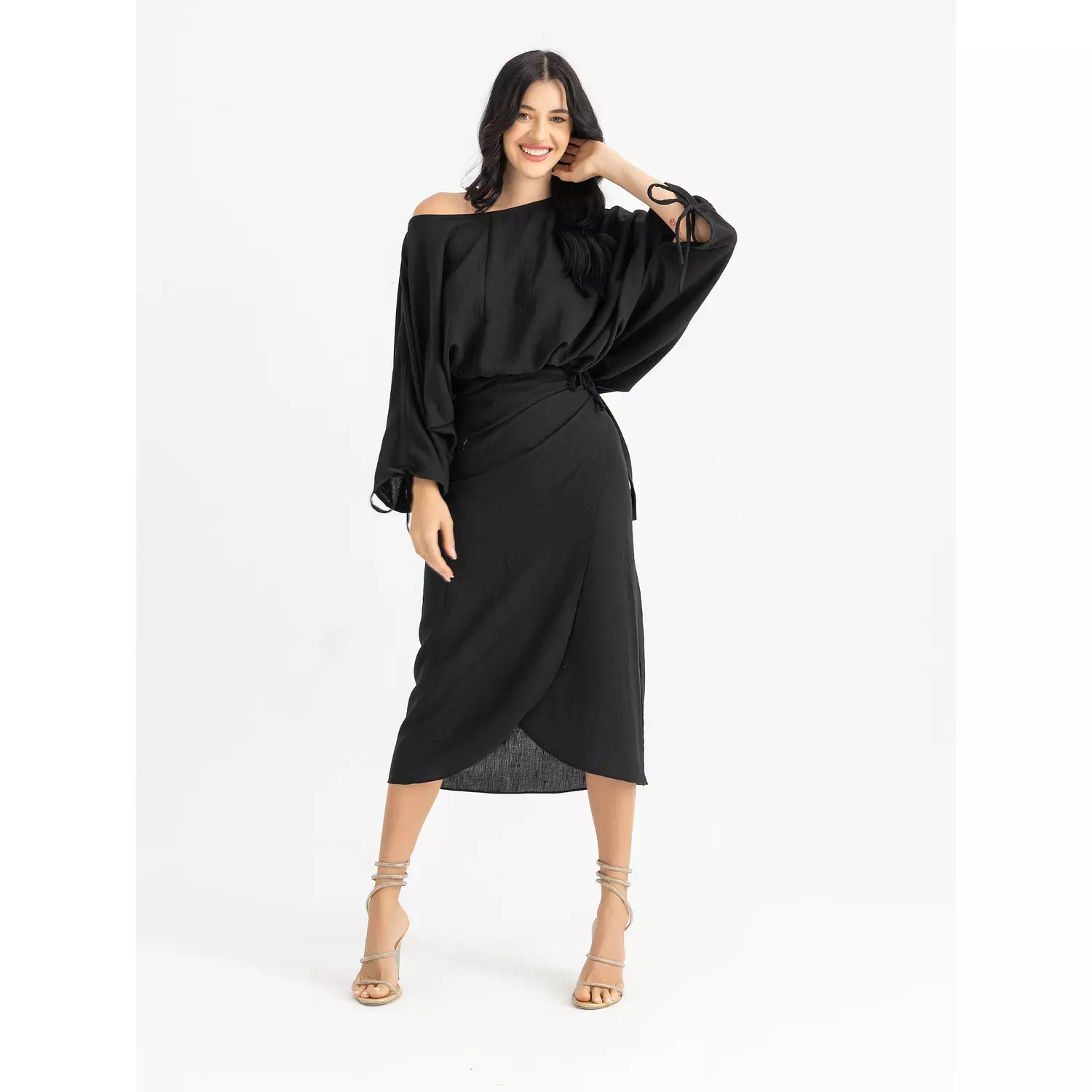 The CAROLINA linen wrapped midi skirt hover image