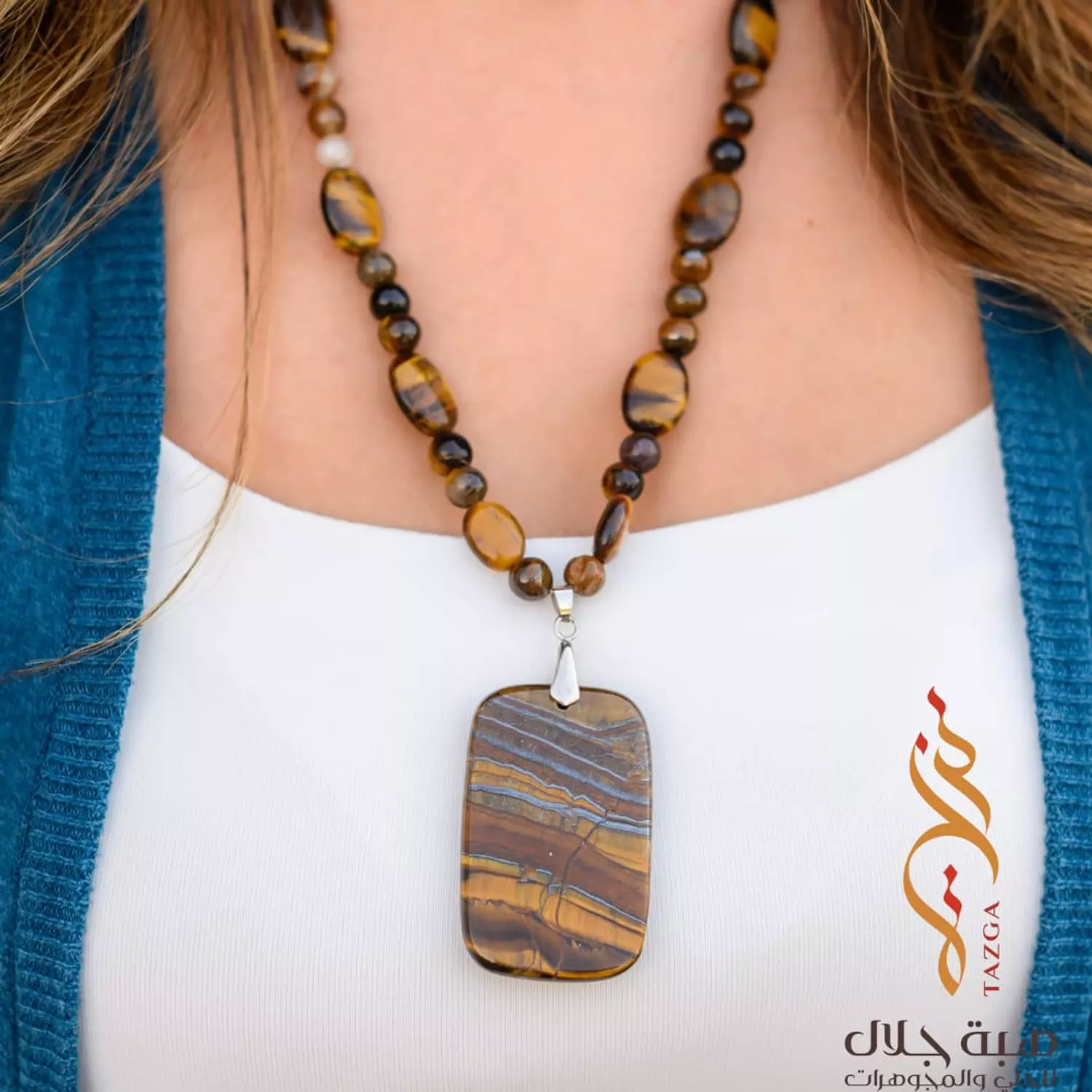 Handmade necklace crafted from natural tiger's eye stone. hover image