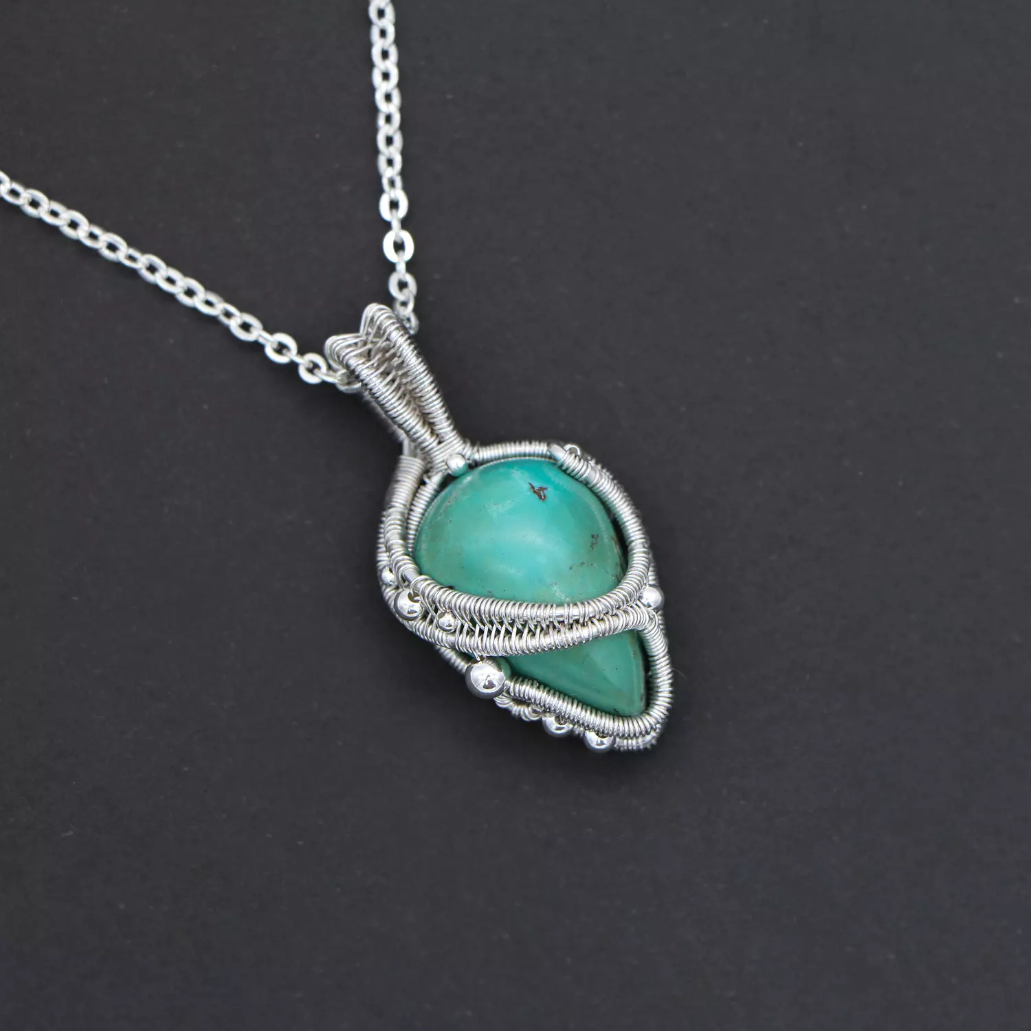 Pendant with turquoise gemstone. 1