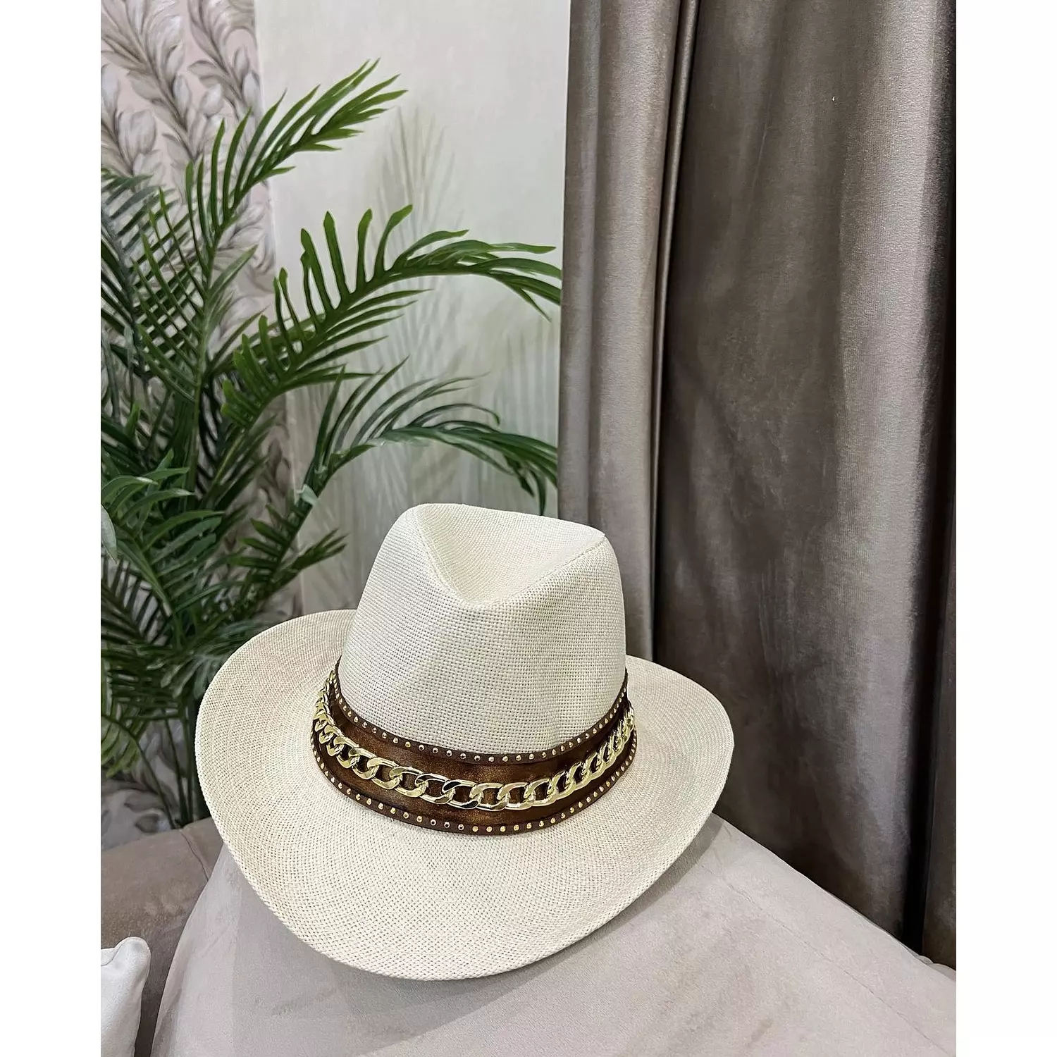 Brown chain hat  hover image