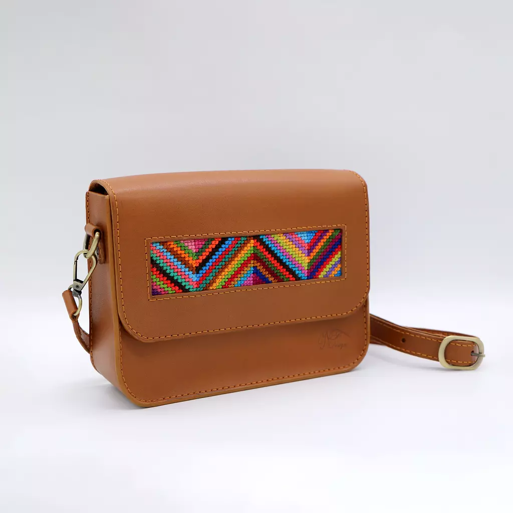 Genuine leather bag with colorful Cross-stitching.