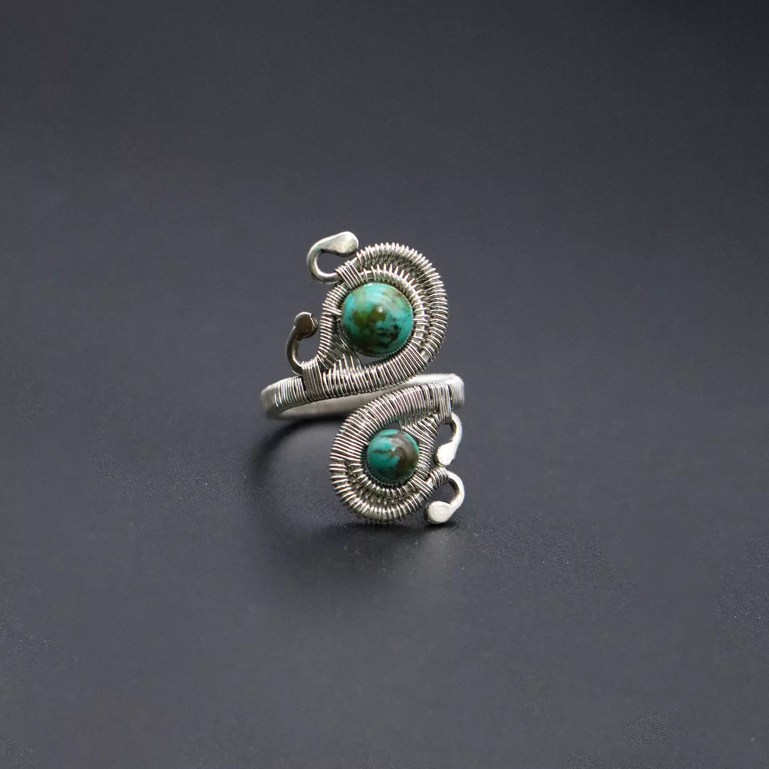 Silver ring with turquoise gemstones. hover image