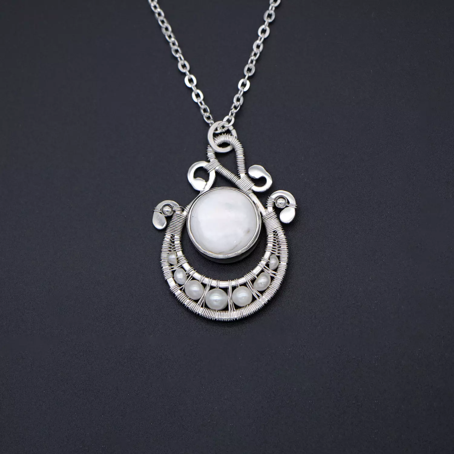  Silver pendant with mother of pearl. hover image