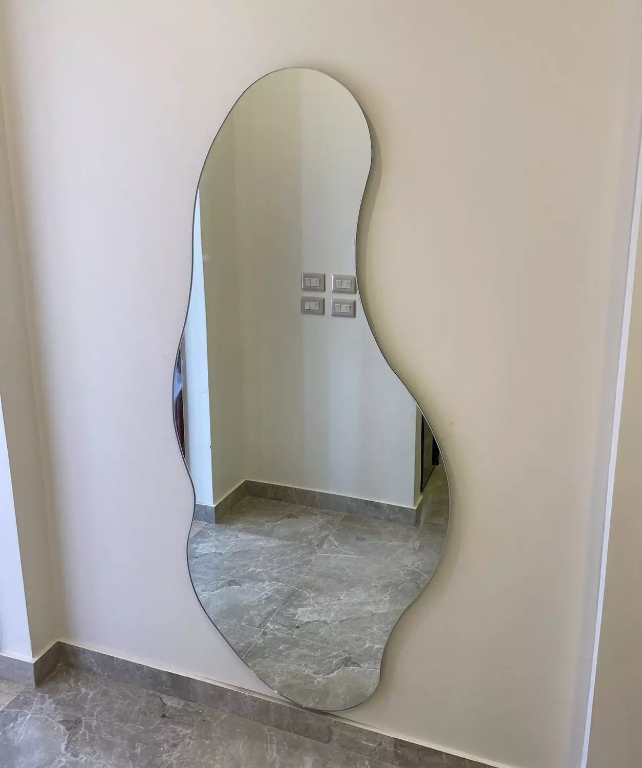 <p><strong>Asymmetric wall mirror</strong></p>