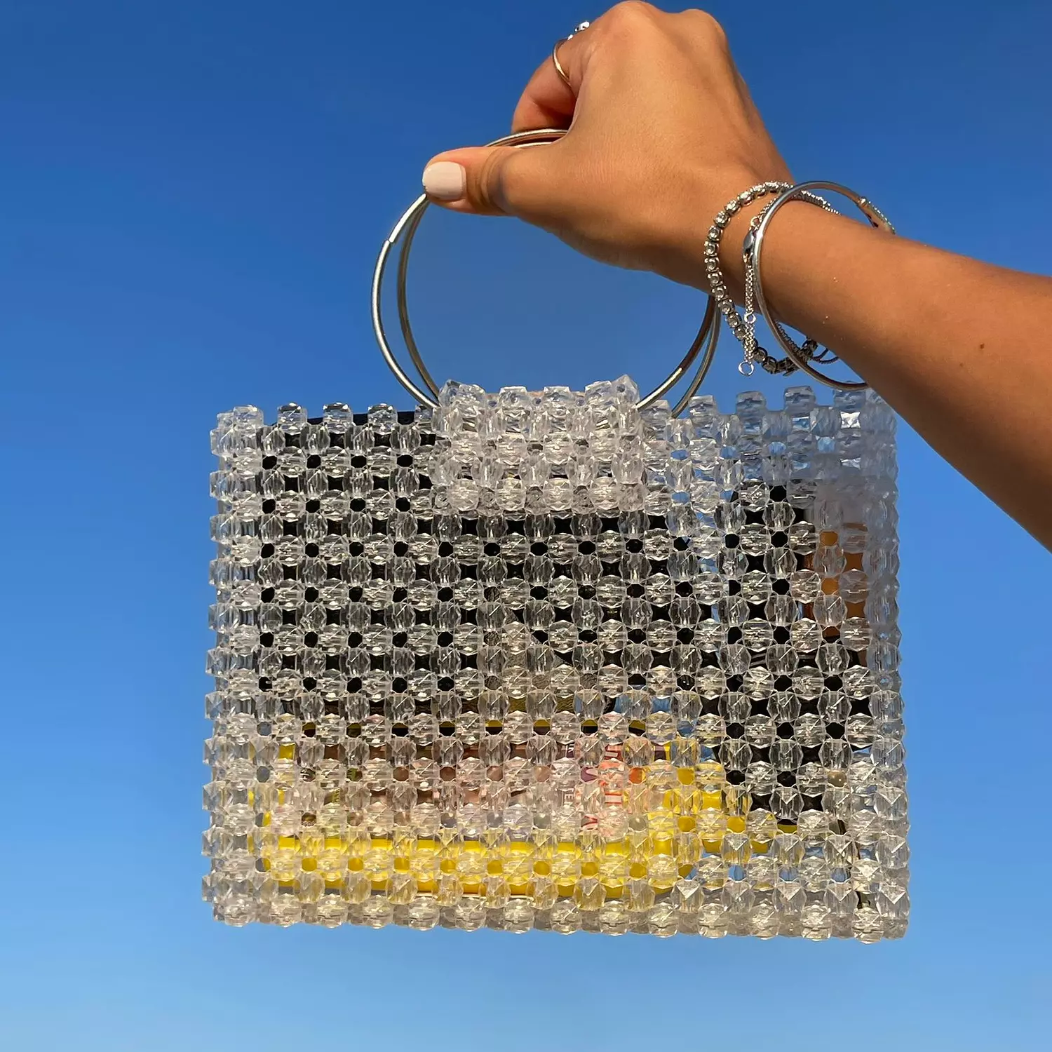 Beaded bag with metal handle hover image