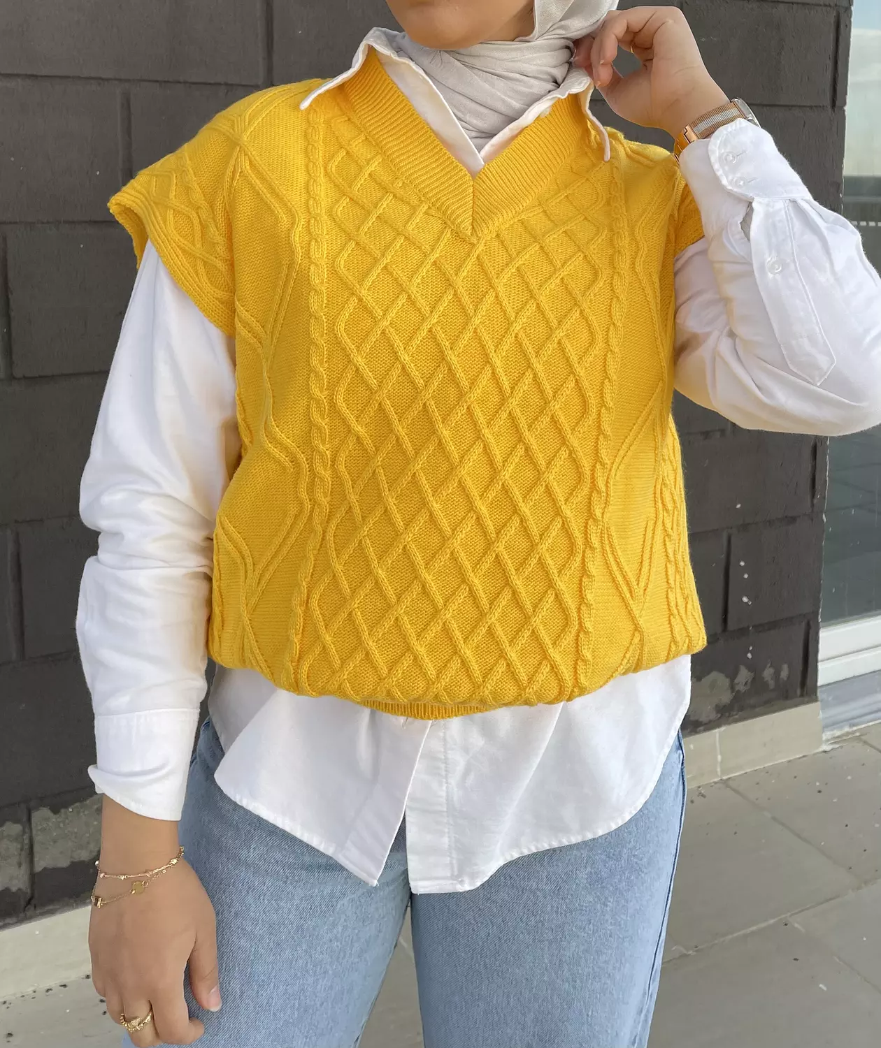 Knitted vest in yellow  hover image