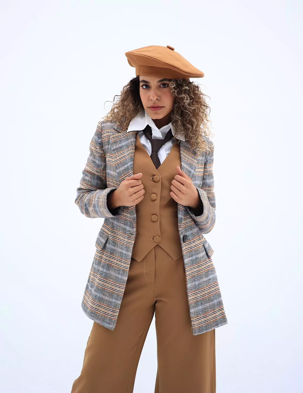 <p><strong>Gray with caramel &amp; brown checked blazer</strong></p><p><br></p>