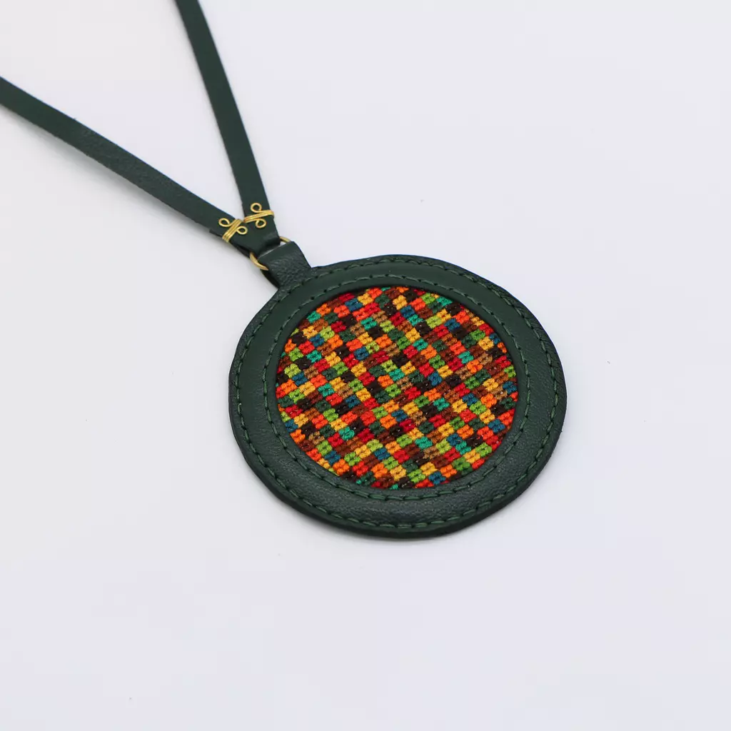 Genuine leather necklace with colorful Cross-stitching.